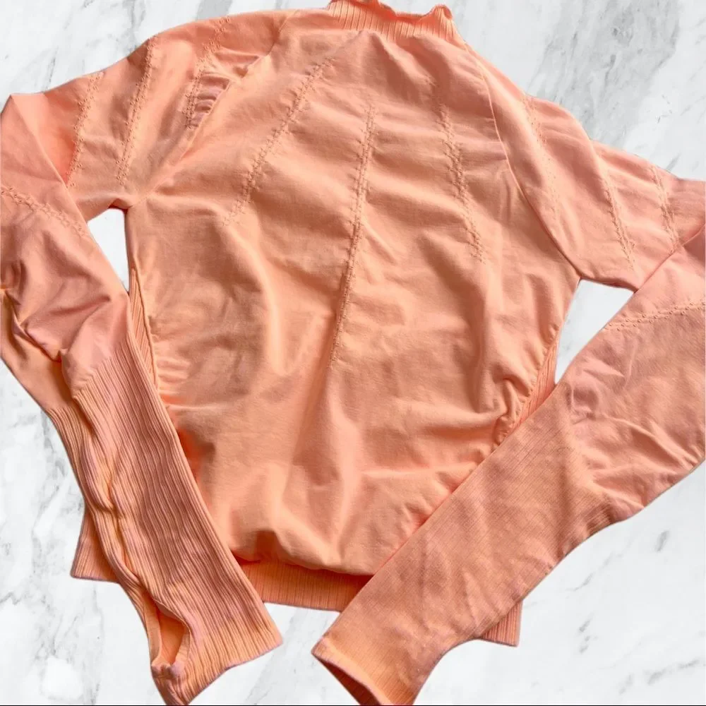 8. New! Free People Movement Good Karma Hi-Neck Layer Long Sleeve Top in Peach - Picture 4 of 12